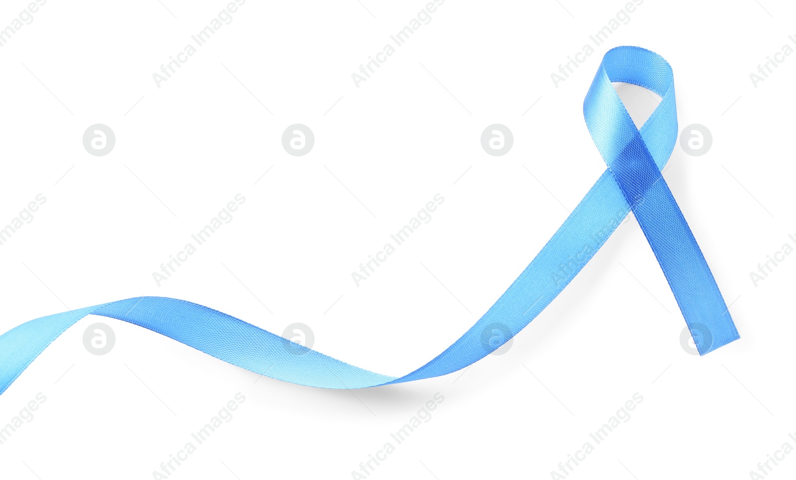 Photo of Light blue awareness ribbon isolated on white, top view