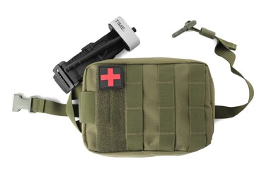 Photo of Military first aid kit and tourniquet on white background, top view