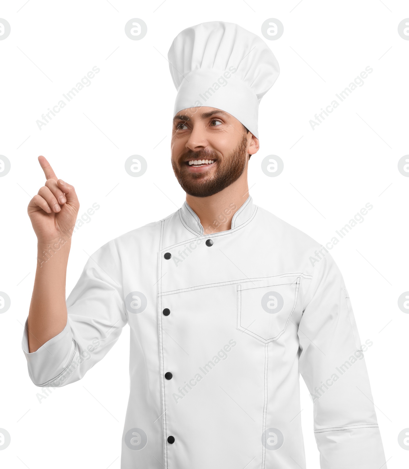 Photo of Smiling mature male chef pointing at something on white background