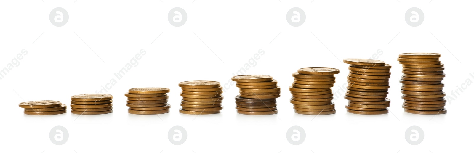 Photo of Stacked coins on white background. Investment concept