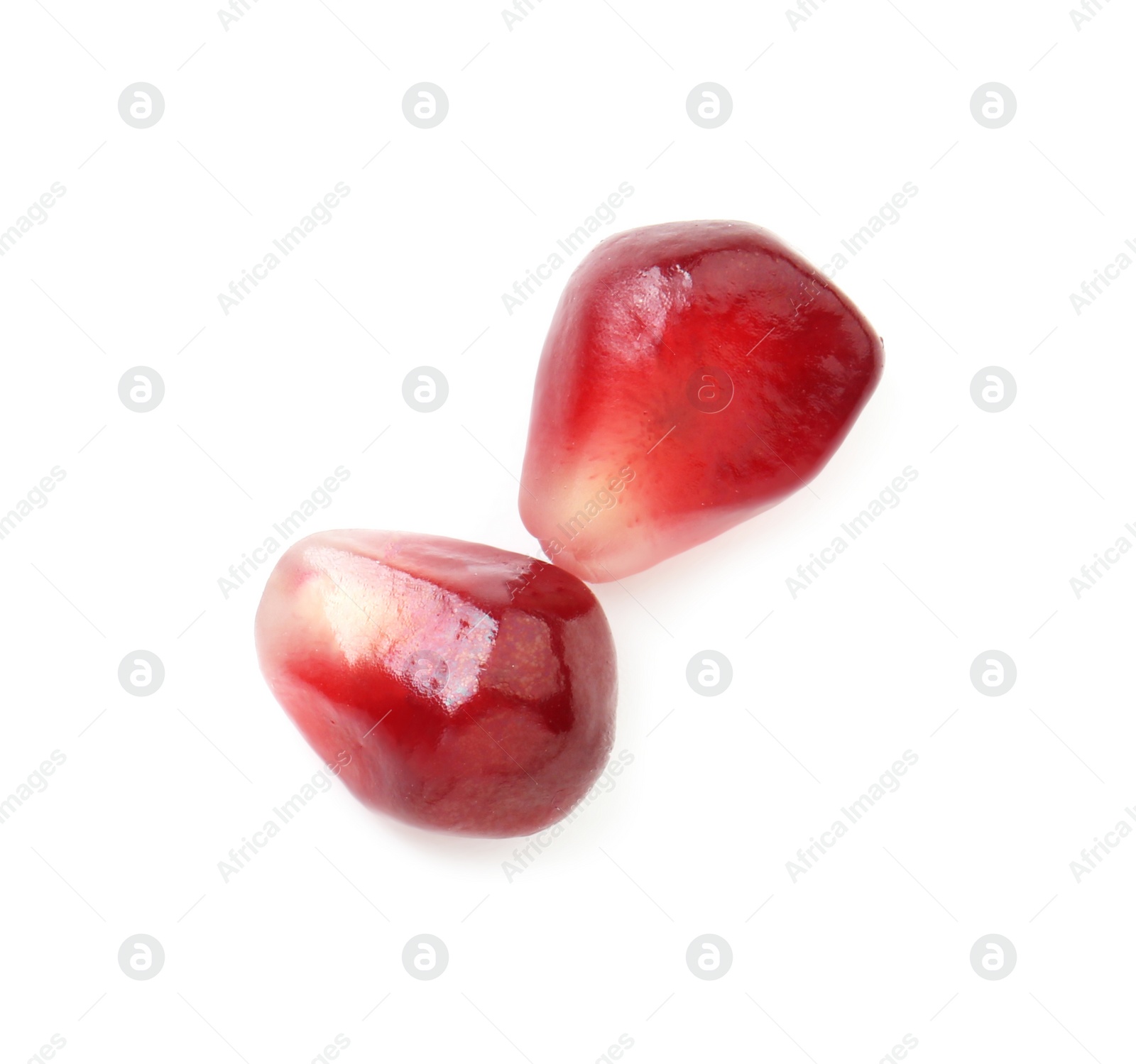 Photo of Ripe juicy pomegranate grains isolated on white, top view