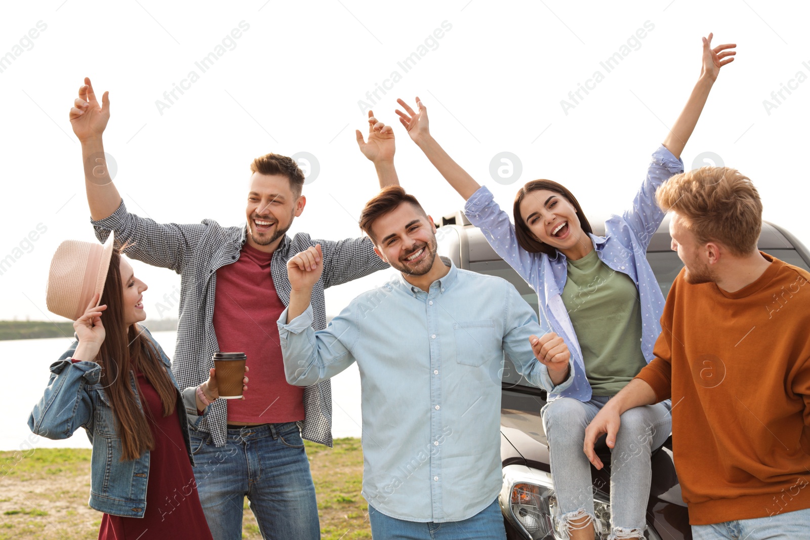 Photo of Group of happy people spending time together outdoors