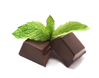 Pieces of dark chocolate with mint on white background