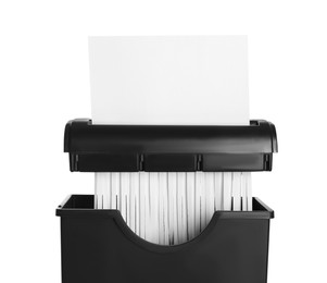 Photo of Destroying paper with shredder on white background