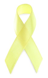 Photo of Yellow ribbon isolated on white, top view. World Cancer Day