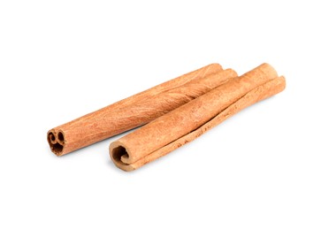 Photo of Two aromatic cinnamon sticks isolated on white
