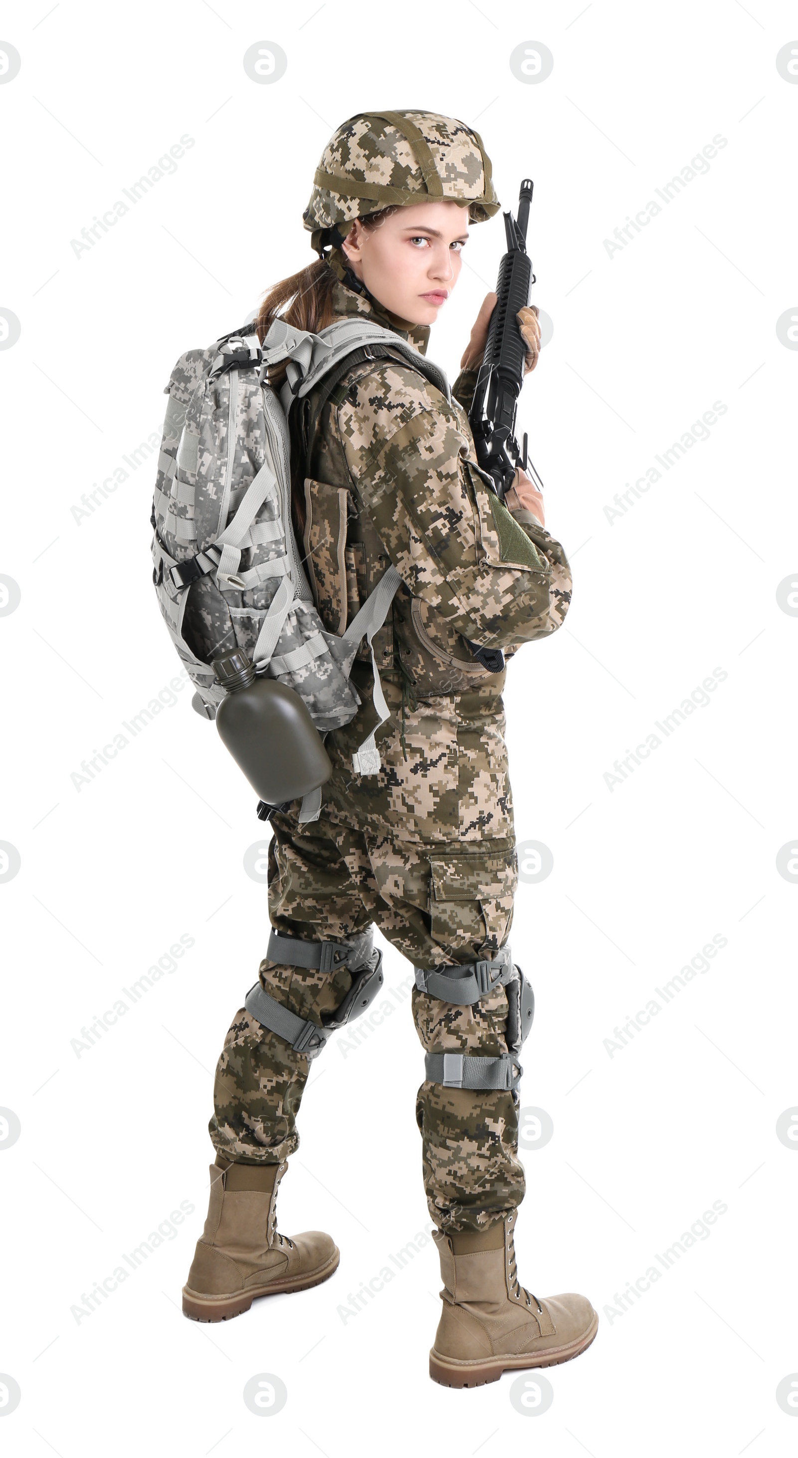 Photo of Female soldier with machine gun on white background. Military service