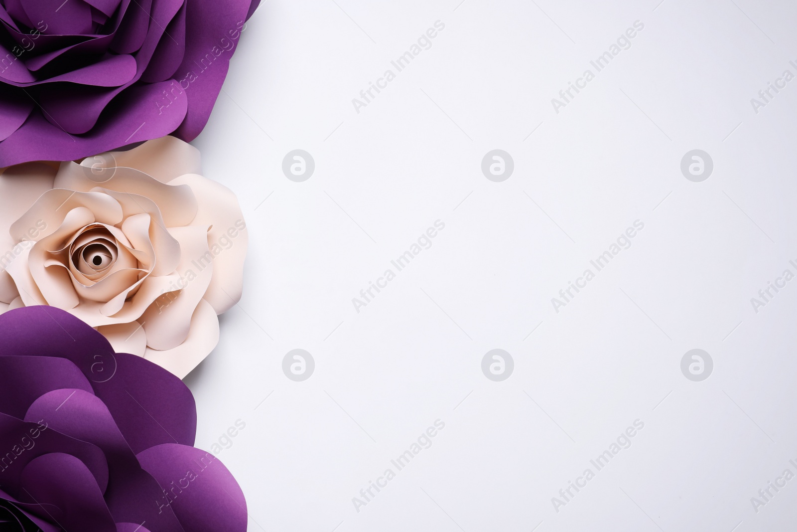 Photo of Different beautiful flowers made of paper on white background, flat lay. Space for text