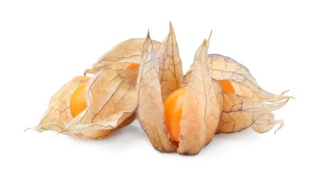 Photo of Many ripe physalis fruits with calyxes isolated on white