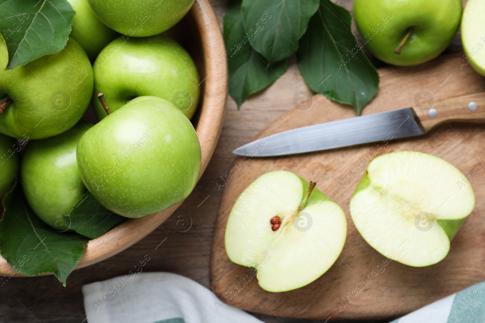 Photo of Flat lay composition with juicy green apples on wooden table