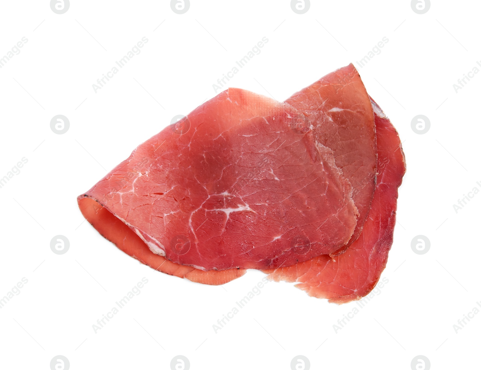 Photo of Slices of tasty bresaola isolated on white, top view