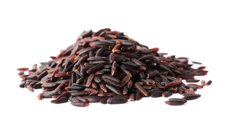 Photo of Pile of uncooked black rice on white background