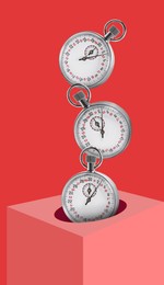 Image of Concept of time. Vintage timer falling into cube on red background