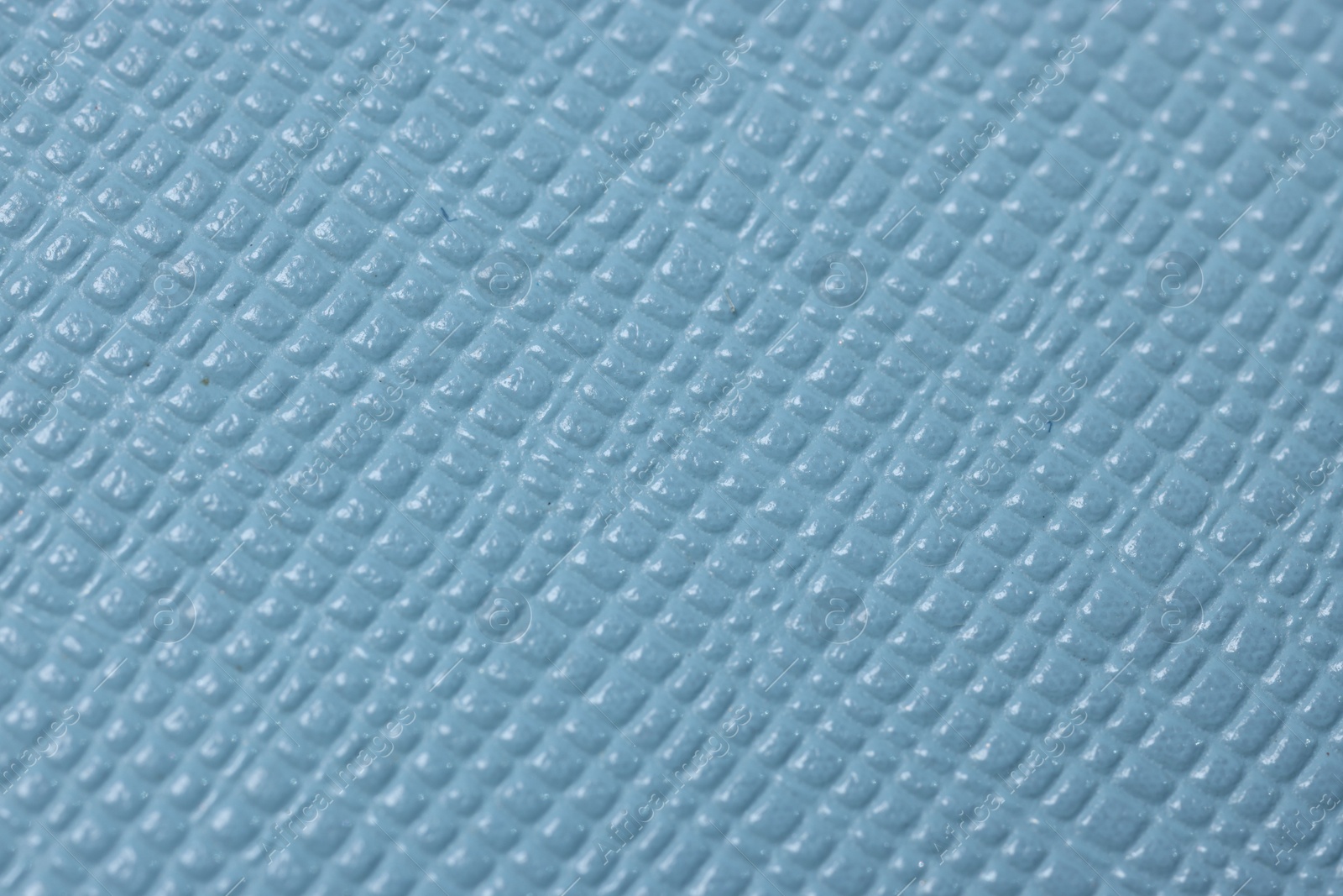 Photo of Light blue leather as background, top view