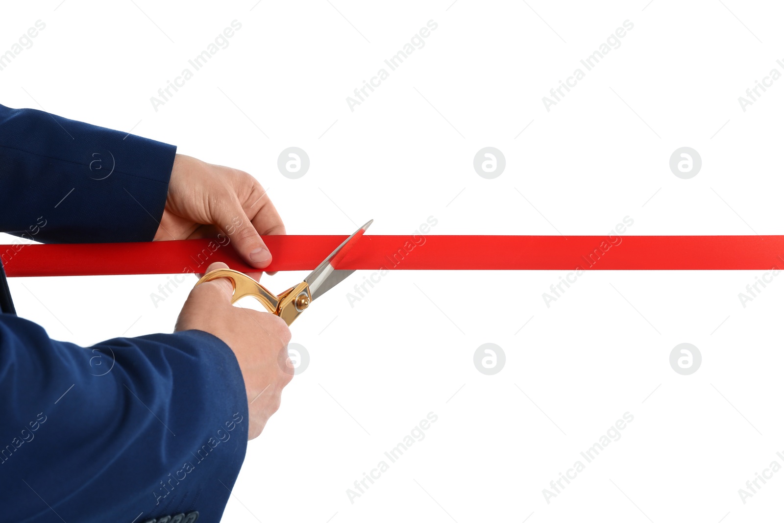 Photo of Man in office suit cutting red ribbon isolated on white, closeup