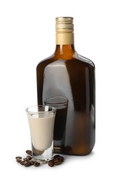 Coffee cream liqueur in bottle, glass and beans isolated on white