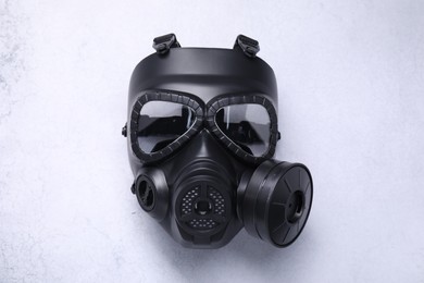 One gas mask on light grey background, top view