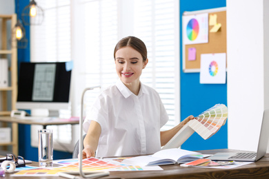 Photo of Professional interior designer at workplace in office