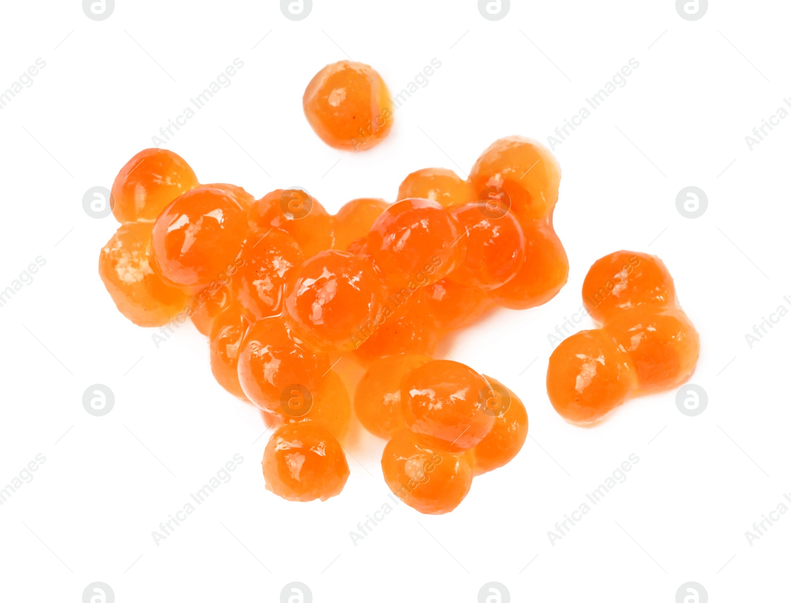 Photo of Pile of delicious red caviar isolated on white, top view