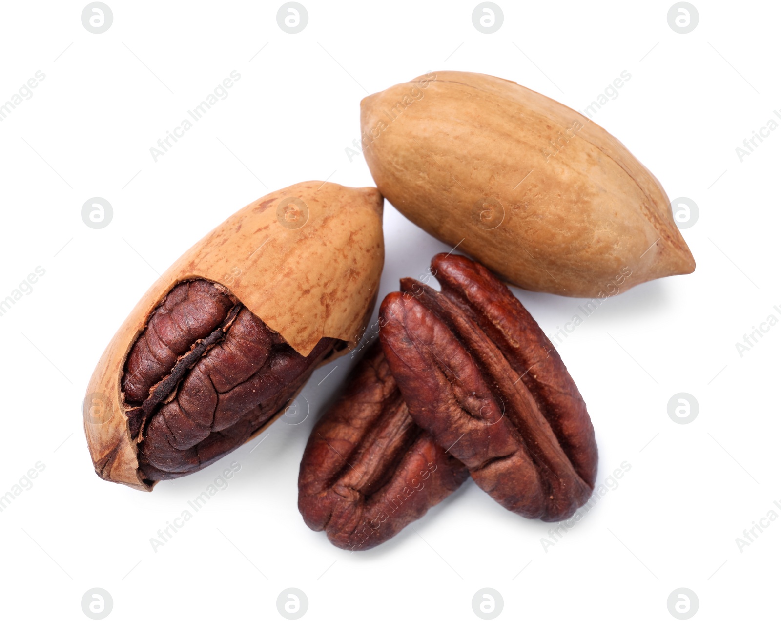 Photo of Many tasty pecan nuts isolated on white, top view