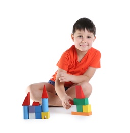 Photo of Cute child playing with colorful blocks on white background