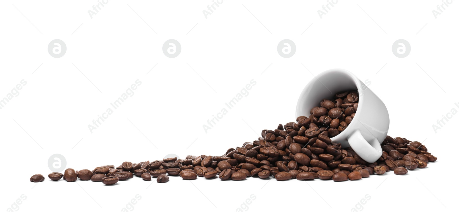 Photo of Overturned cup with roasted coffee beans on white background