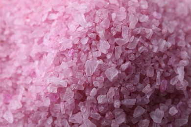 Photo of Beautiful pink sea salt as background, closeup
