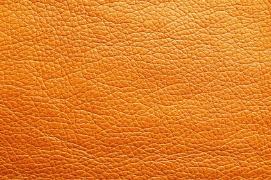 Image of Texture of orange leather as background, closeup