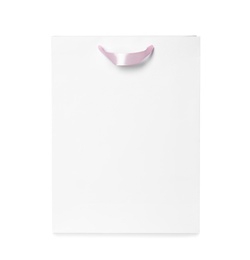 Photo of Paper shopping bag isolated on white. Mock up for design