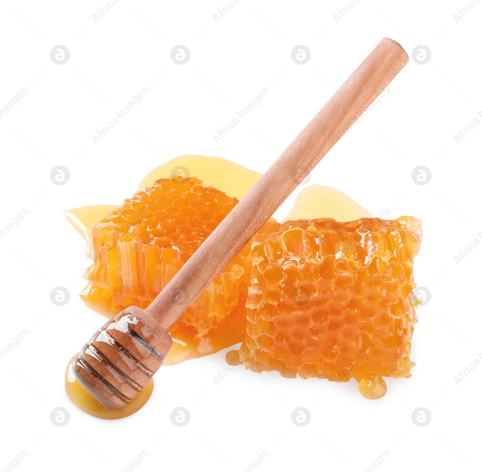 Photo of Natural honeycombs with honey and wooden dipper isolated on white