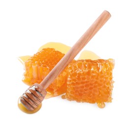 Photo of Natural honeycombs with honey and wooden dipper isolated on white