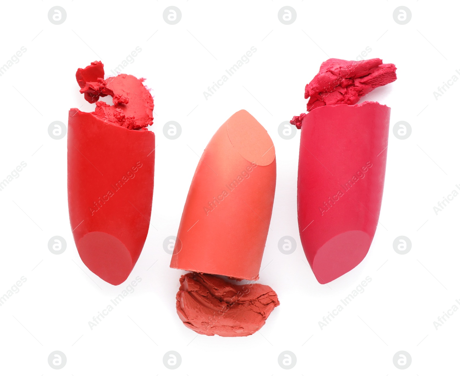 Photo of Different beautiful lipsticks on white background, top view