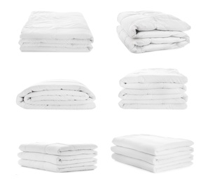 Image of Set of folded blankets isolated on white