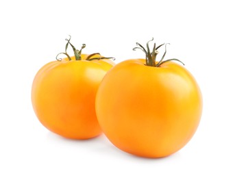 Photo of Fresh ripe yellow tomatoes on white background