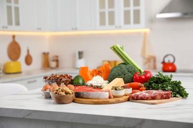 Composition with healthy food on white table. Keto diet