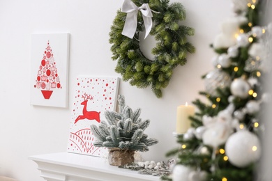 Beautiful Christmas pictures in festive room interior