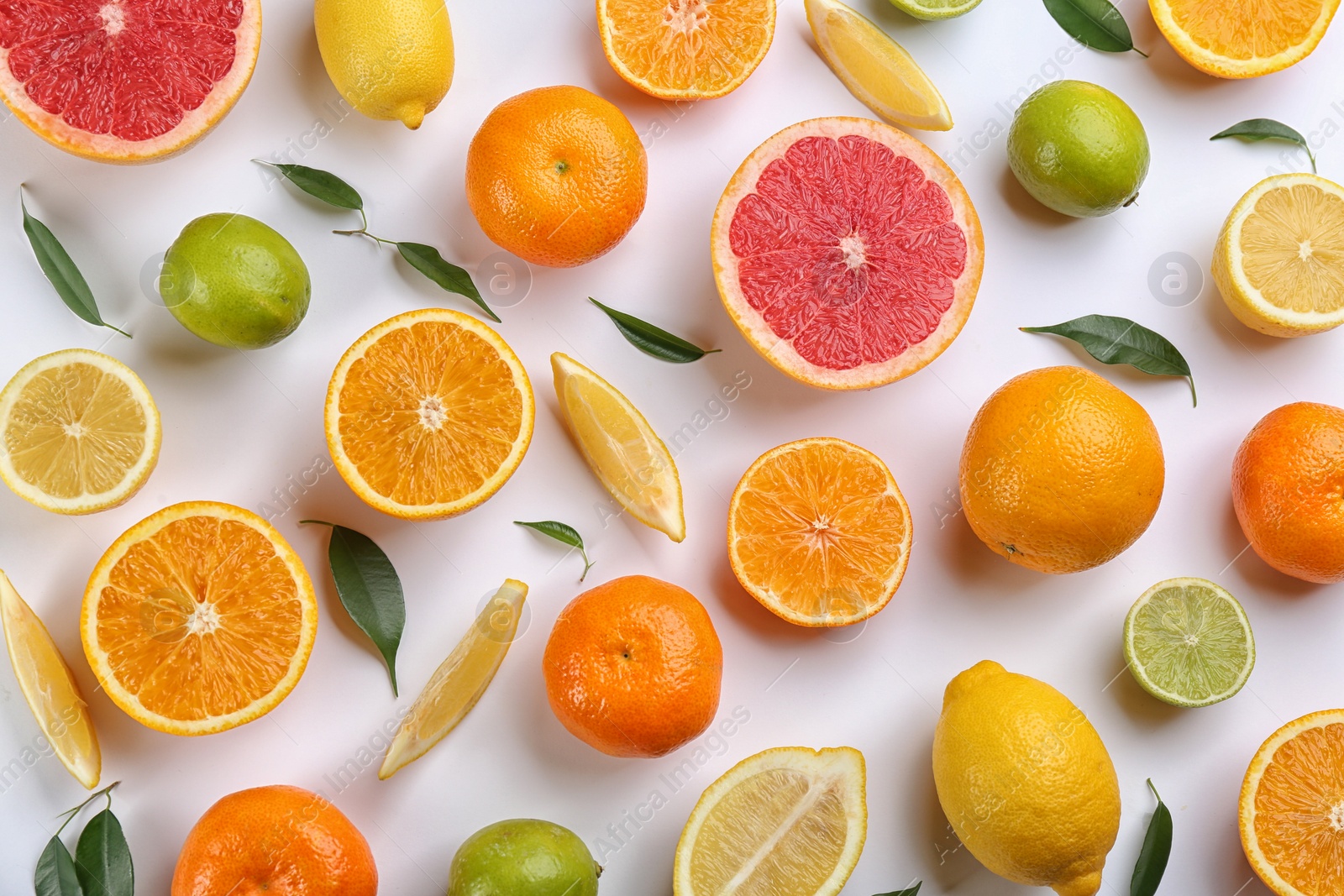 Photo of Flat lay composition with tangerines and different citrus fruits on white background