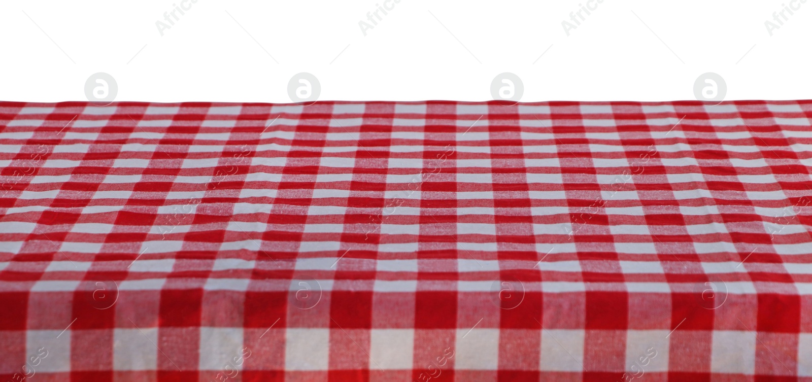 Photo of Table with checkered picnic cloth isolated on white