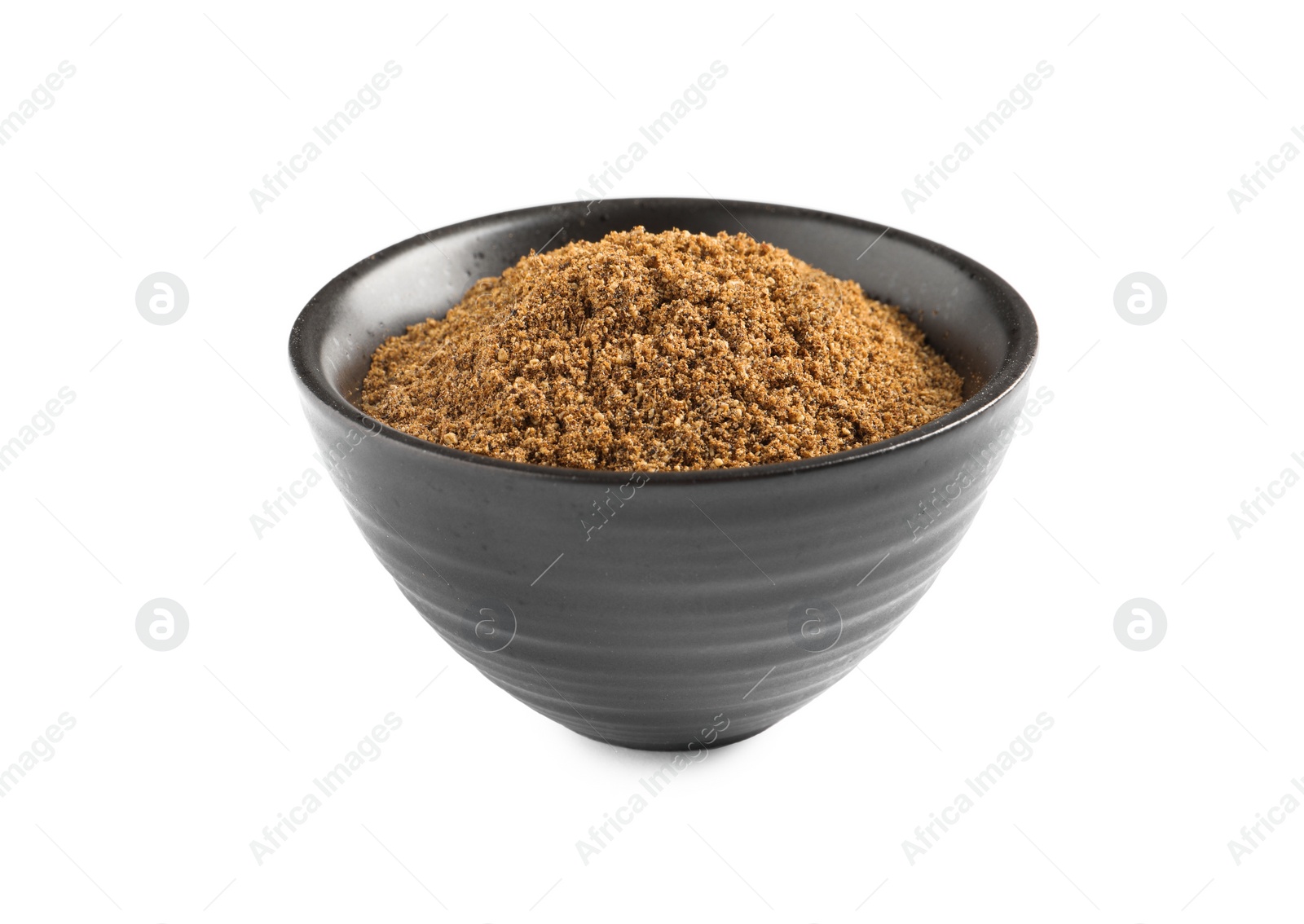 Photo of Bowl of aromatic caraway (Persian cumin) powder isolated on white