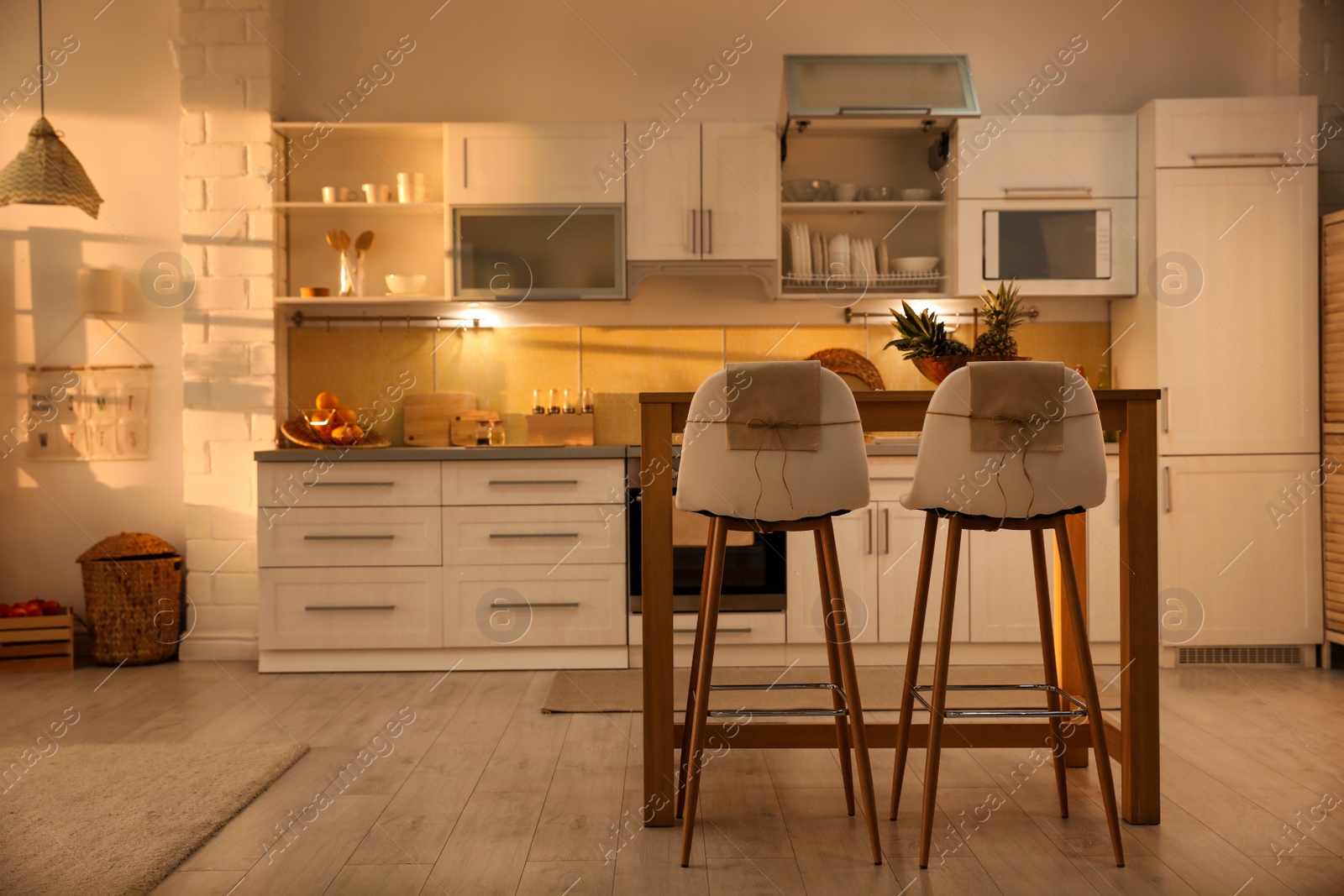 Photo of Modern kitchen interior with stylish wooden table