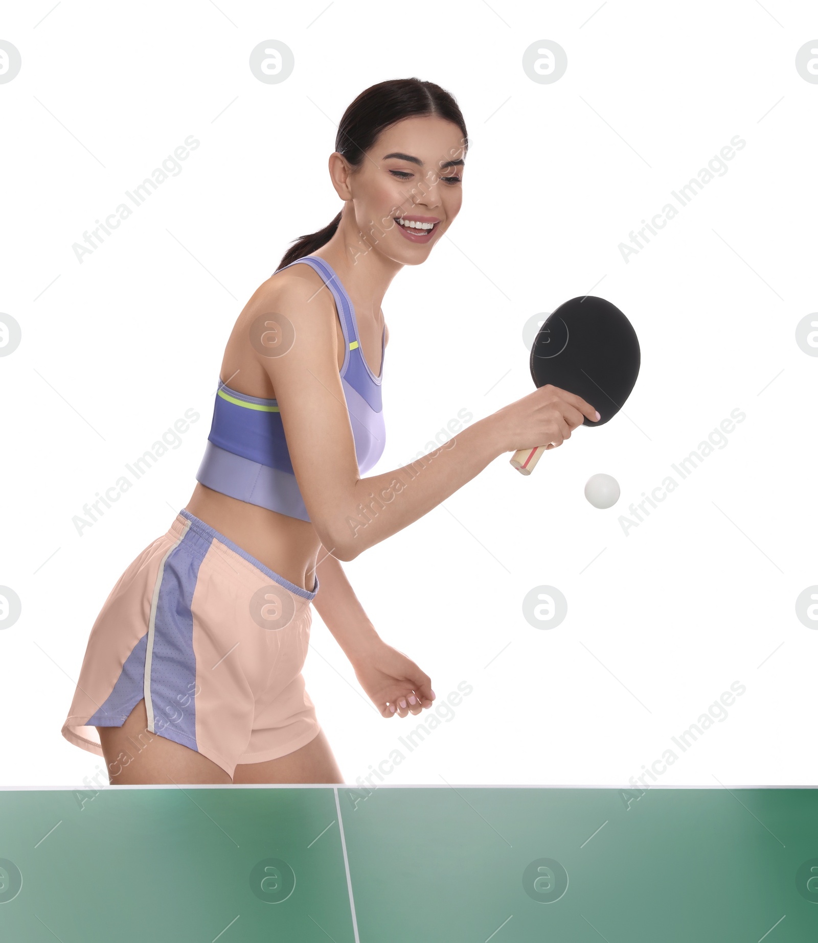 Photo of Beautiful young woman playing ping pong on white background