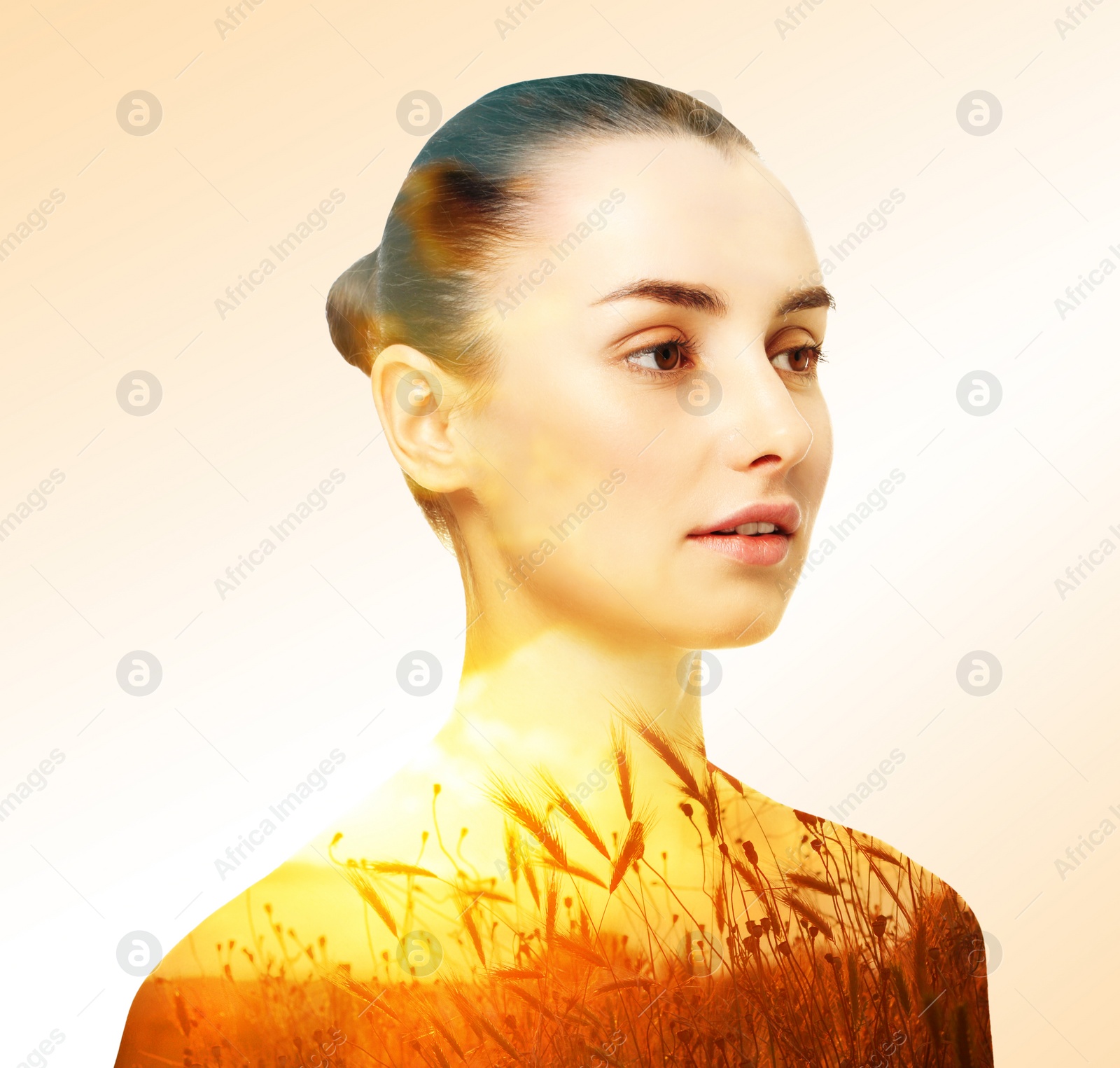 Image of Double exposure of beautiful woman and plants in field at sunset