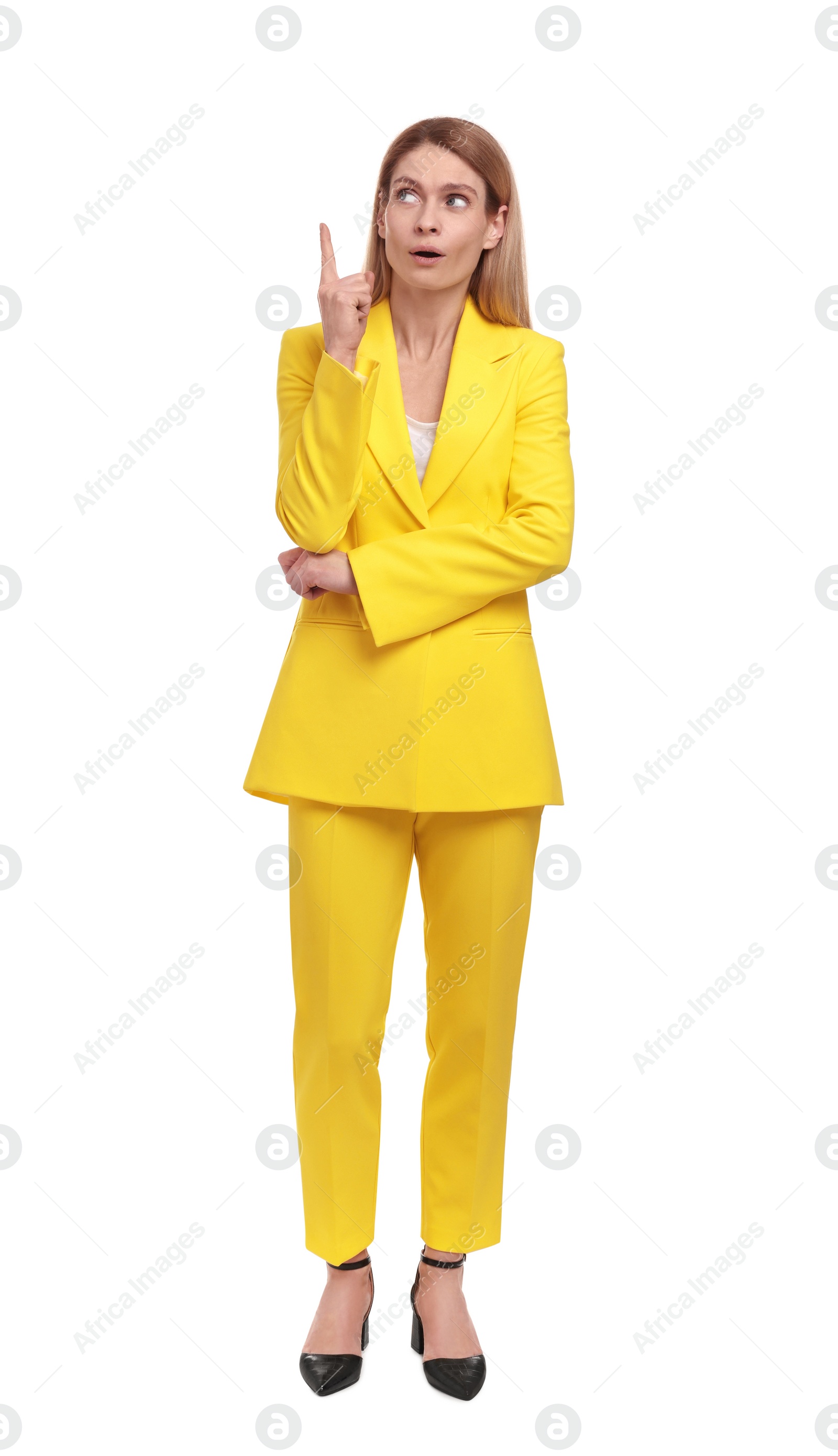 Photo of Beautiful business woman pointing at something on white background