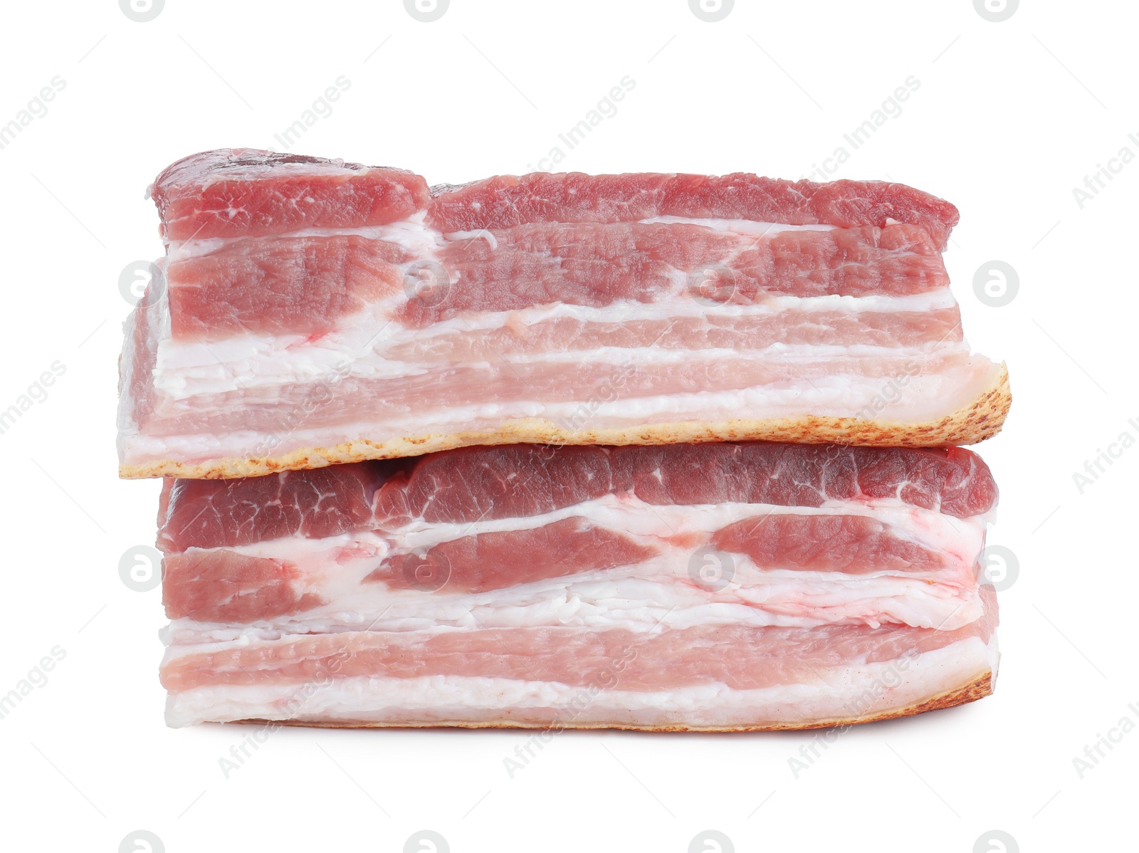 Photo of Pieces of raw pork belly isolated on white