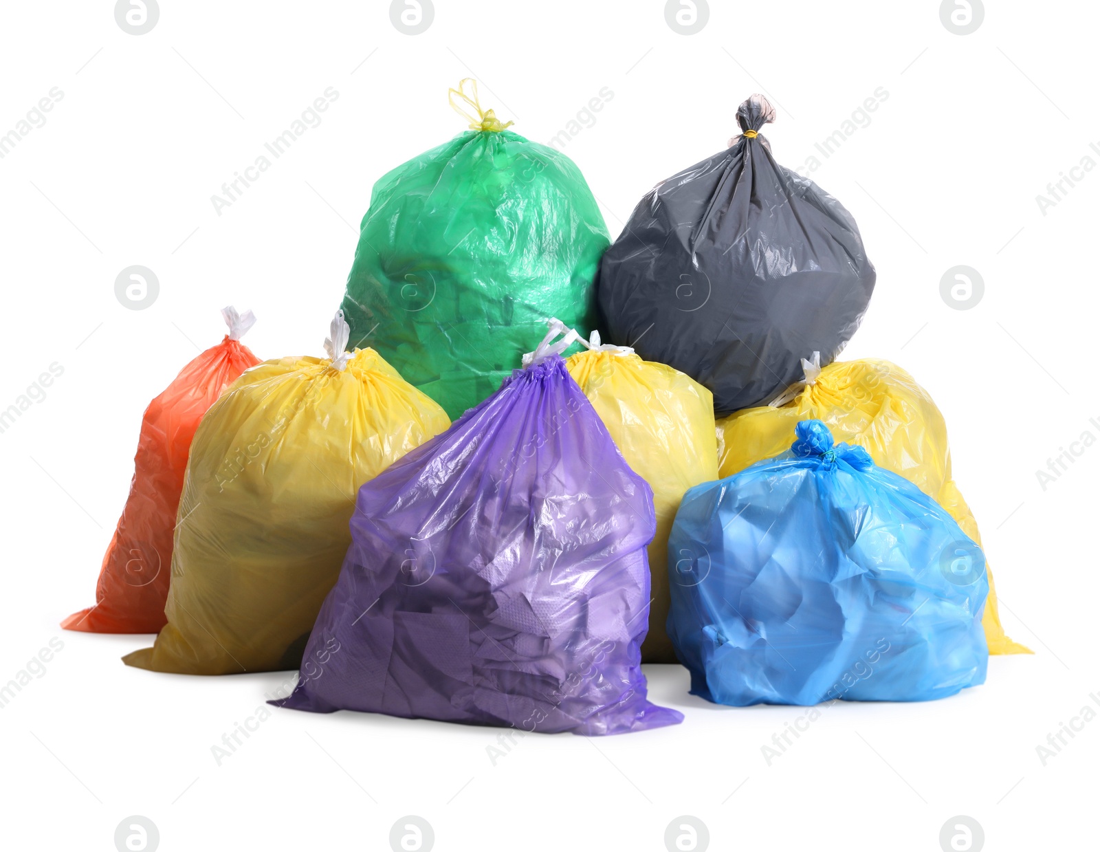 Photo of Trash bags full of garbage on white background