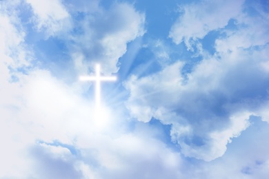 Image of Cross silhouette in blue sky. Resurrection of Jesus