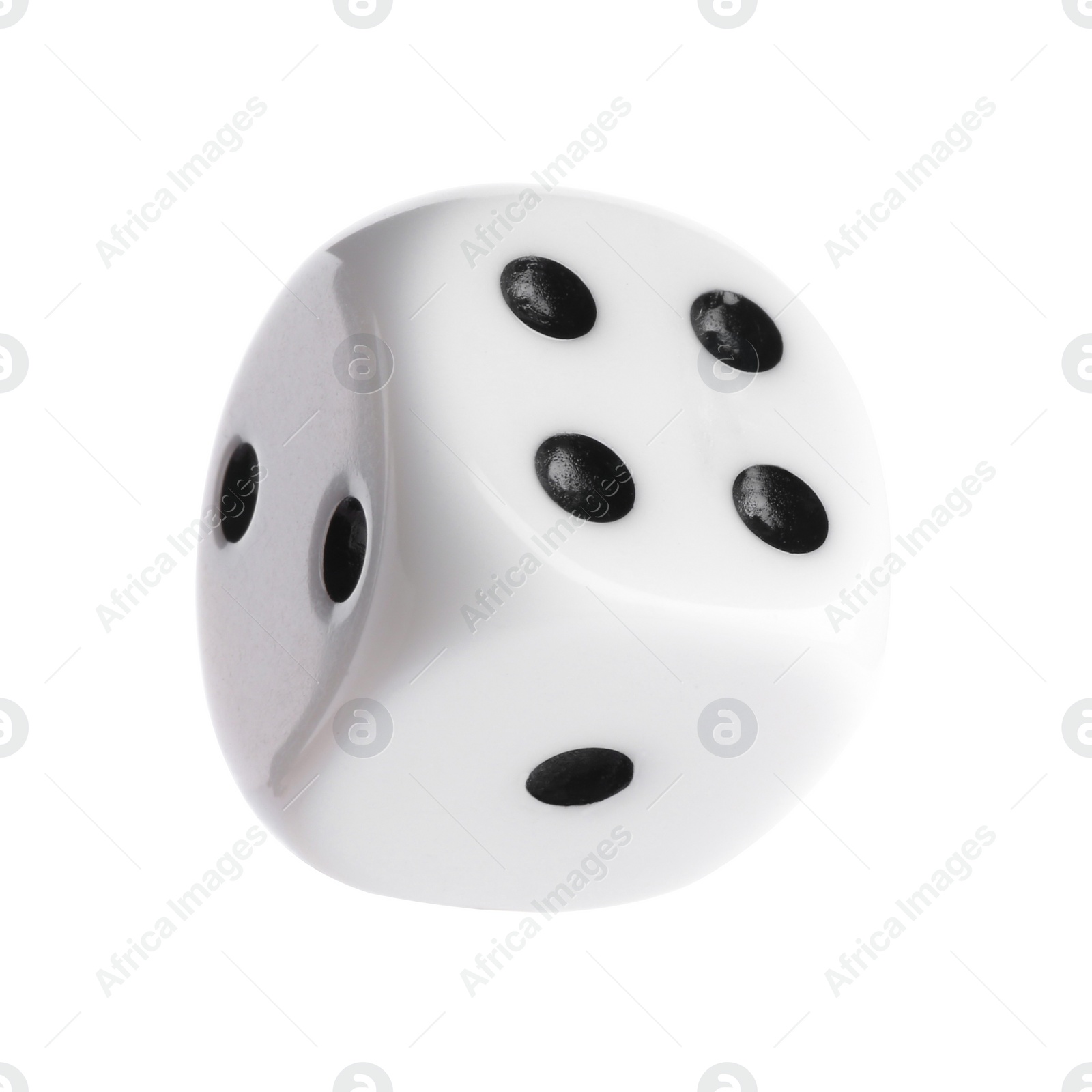 Photo of One plastic game dice isolated on white