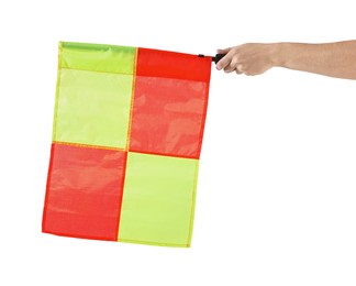 Referee holding linesman flag on white background, closeup