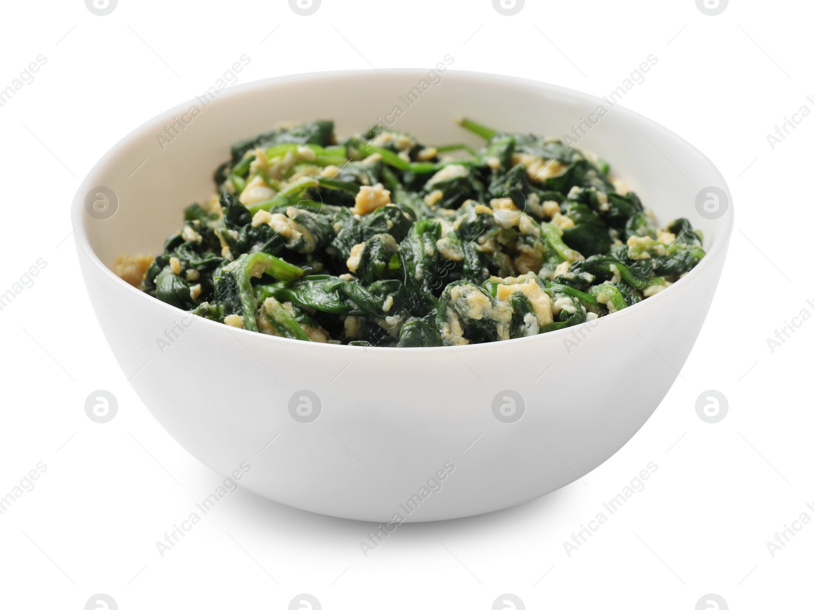 Photo of Tasty spinach dip with eggs in bowl isolated on white