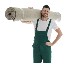 Photo of Male worker with rolled carpet on white background